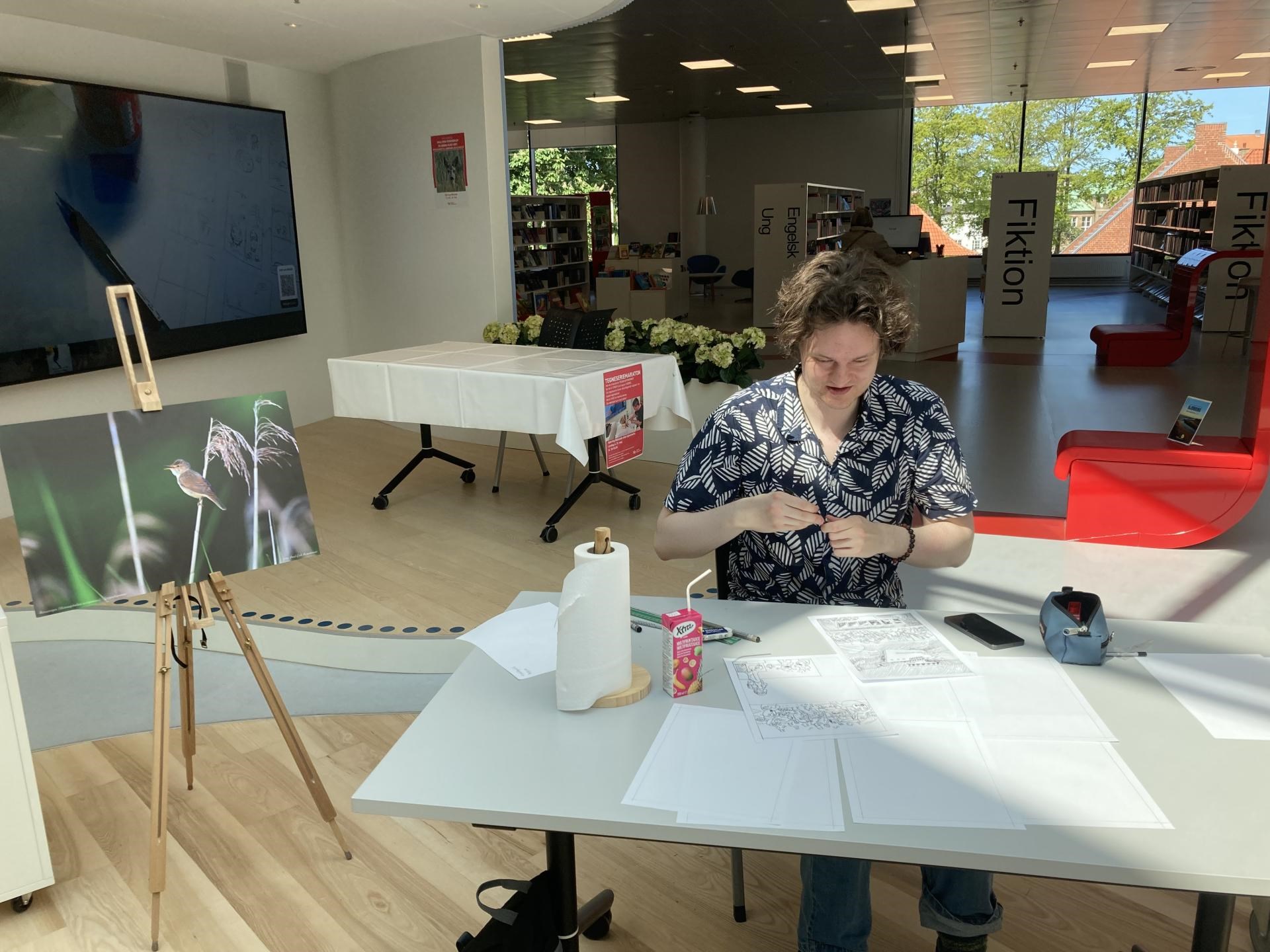 Oplev live-tegning på biblioteket!