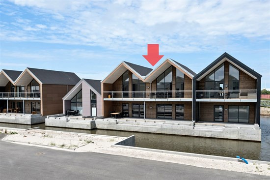 Moderne ferielejlighed med udsigt til havn og fjord i Hvide Sande