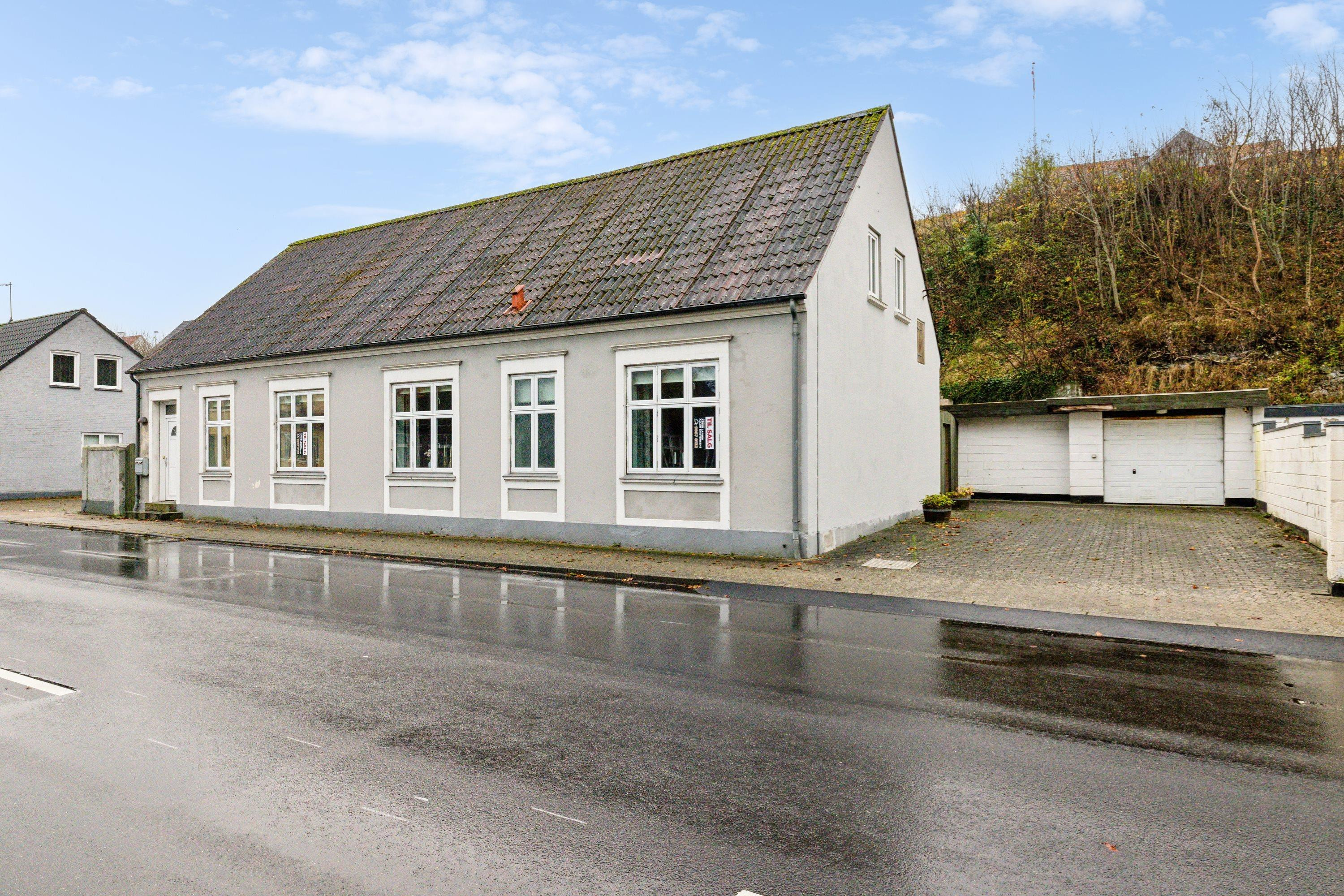 Til salg hos Mæglerhuset  Asger Larsen: Hyggeligt byhus i hjertet af Løgstør