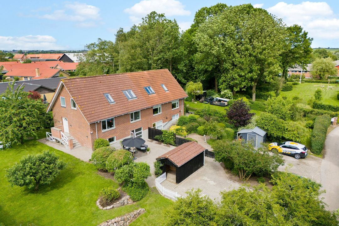 Ny pris på charmerende dobbelthus hos EDC Mæglerne Hedensted
