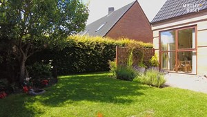 Attraktiv og velholdt andelsbolig med fantastisk have i Vodskov