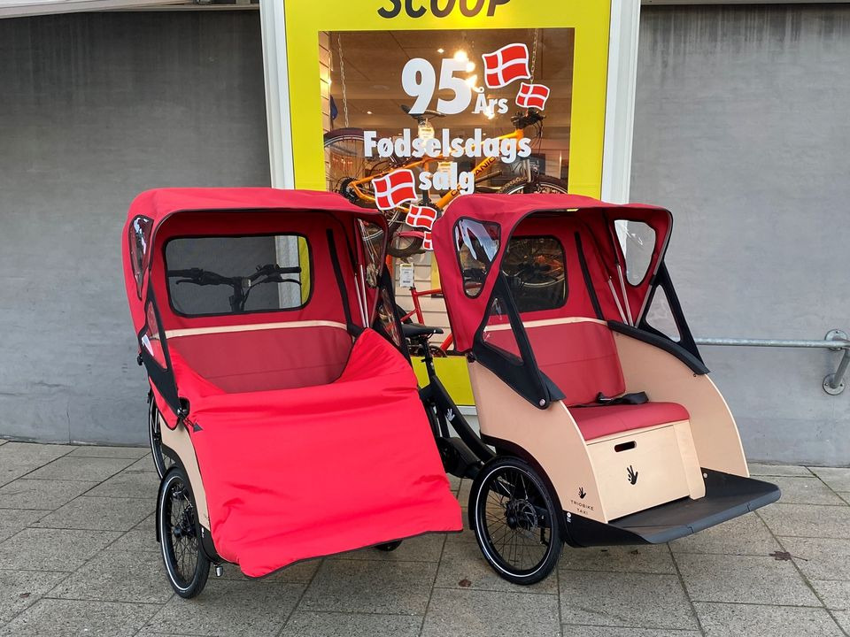 Glad kunde modtager Triobike Taxi hos Fri BikeShop Nørresundby