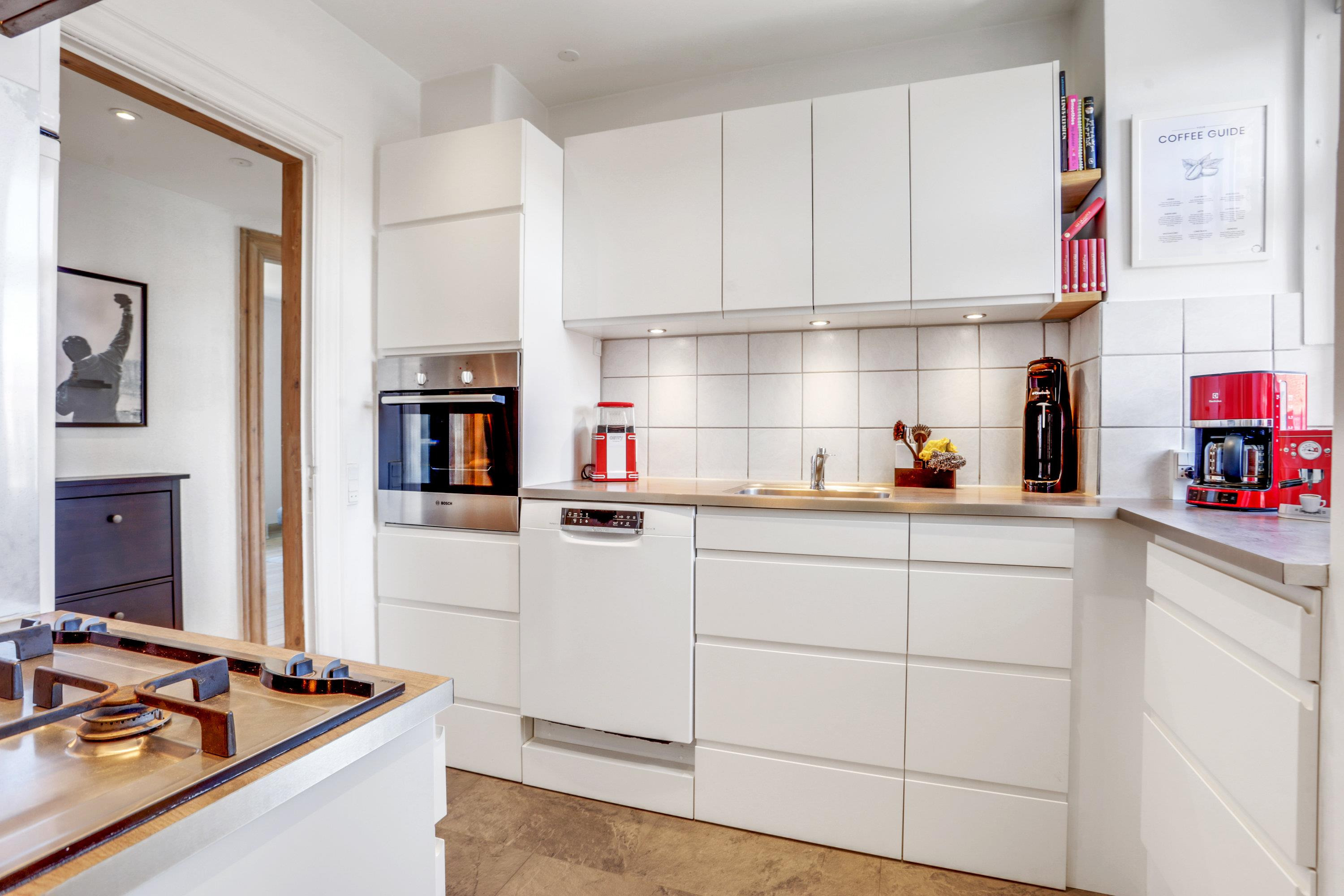 Rummelig lejlighed med attraktiv beliggenhed i Øgadekvarteret