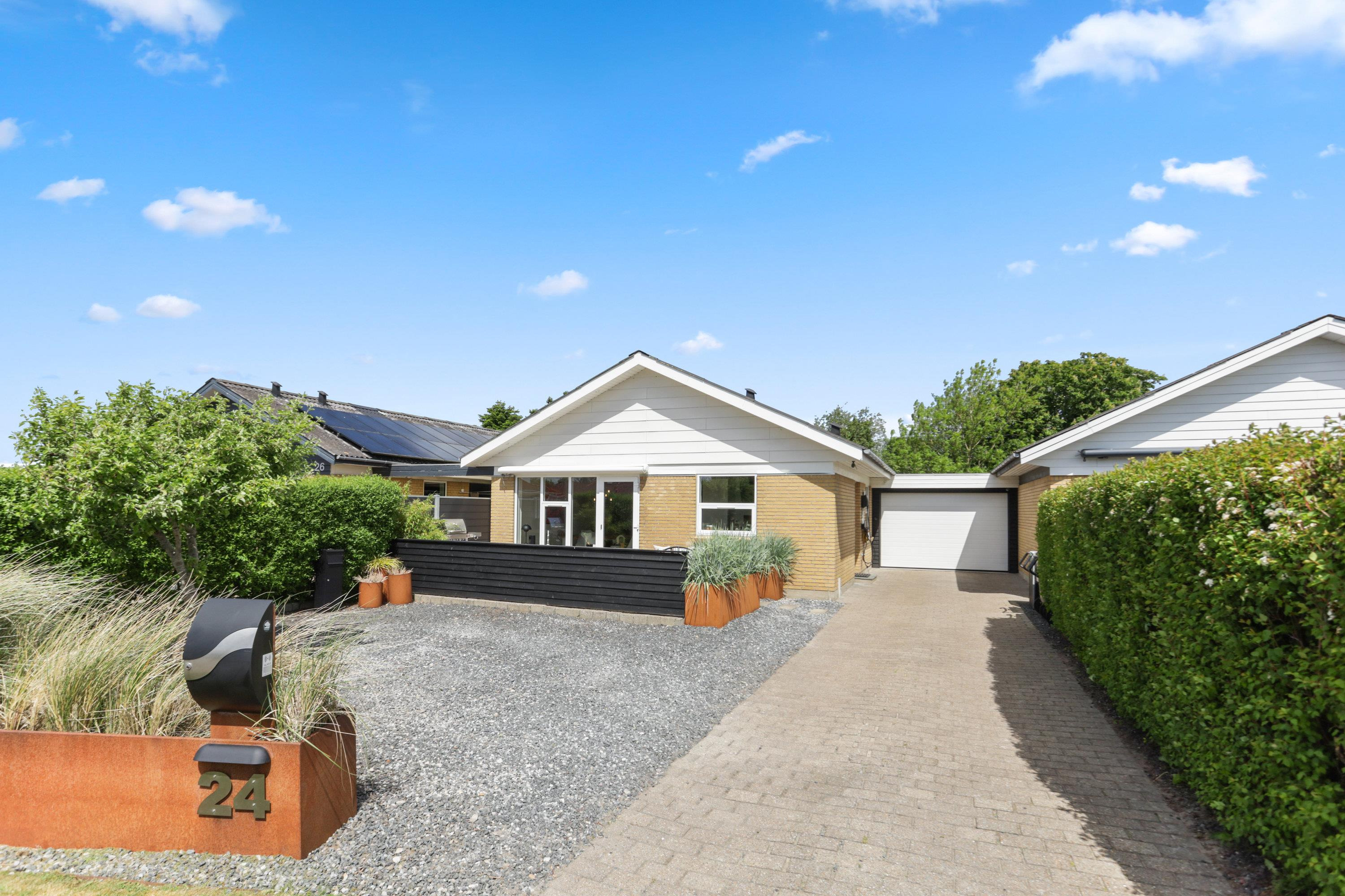 Indflytningsklar villa med moderne komfort og central beliggenhed