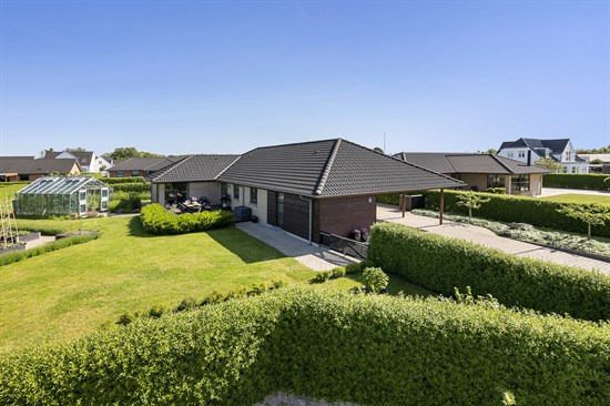 Til salg hos Nybolig Brønderslev & Vrå: Indbydende villa med plads til familien
