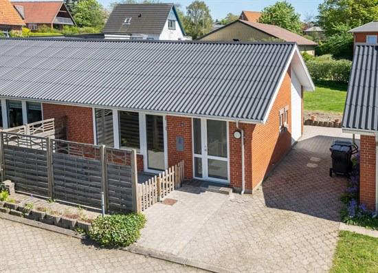 Centralt beliggende andelsbolig, der fremstår velholdt - lige til at flytte ind i!