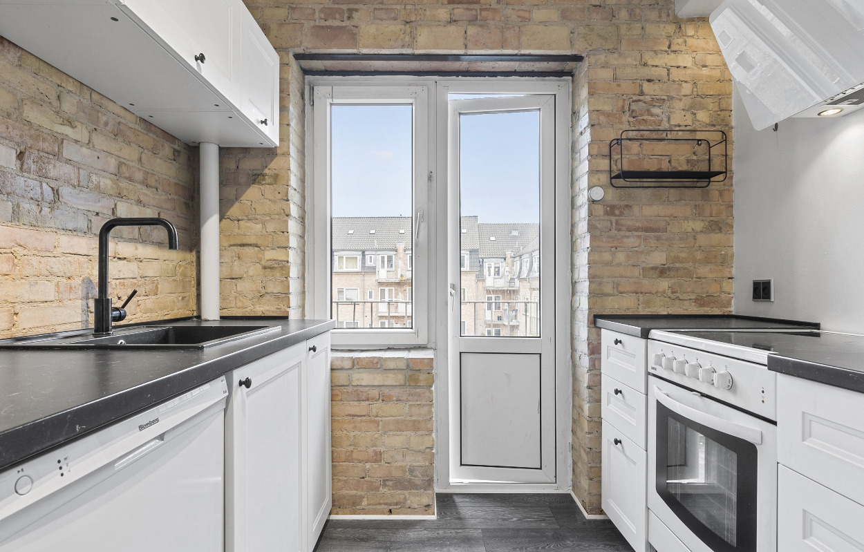 Charmerende an­dels­lej­lig­hed på skøn beliggenhed til salg hos EDC Trio