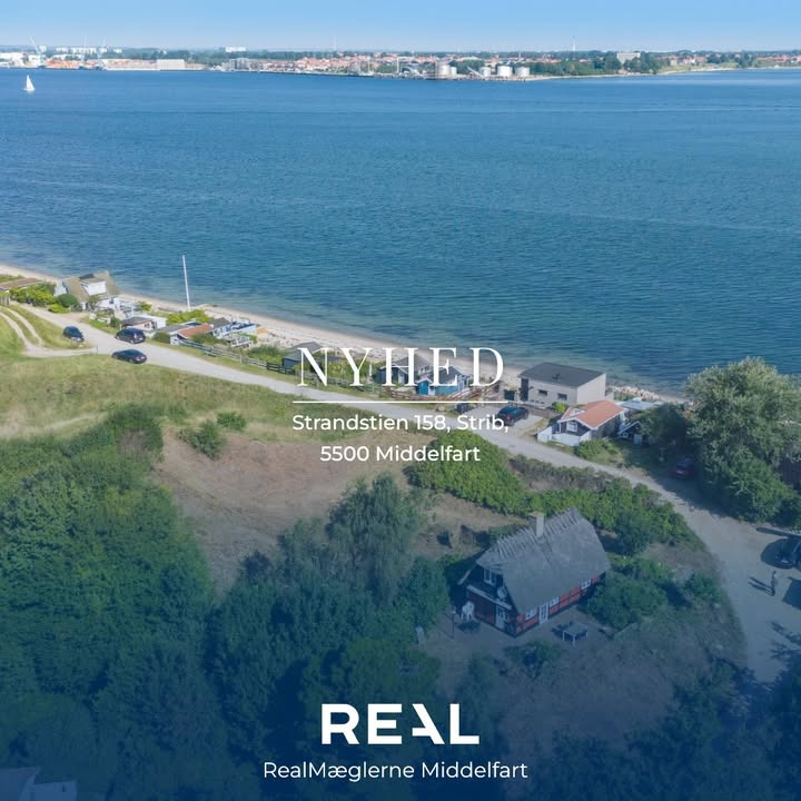 RealMæglerne Middelfart præsenterer charmerende sommerhus i Strib