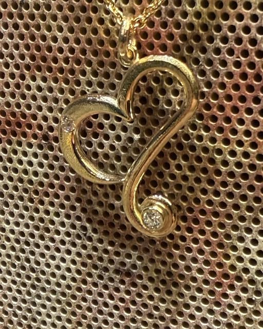 Guldsmed Lütken ønsker glædelig jul og mindes kærligt tabt familiemedlem