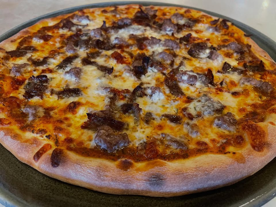 Restaurant Cooks inviterer dig til at smage deres populære pizza nr. 1 – Oriental