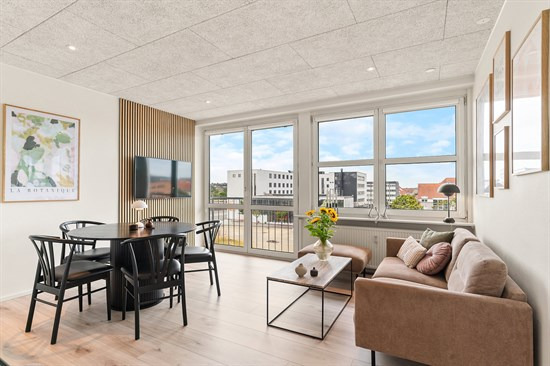 Til salg hos danbolig Randers: Central moderne lejlighed med lave fællesudgifter