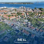 RealMæglerne Middelfart præsenterer charmerende bindingsværkshus til salg i centrum af Middelfart