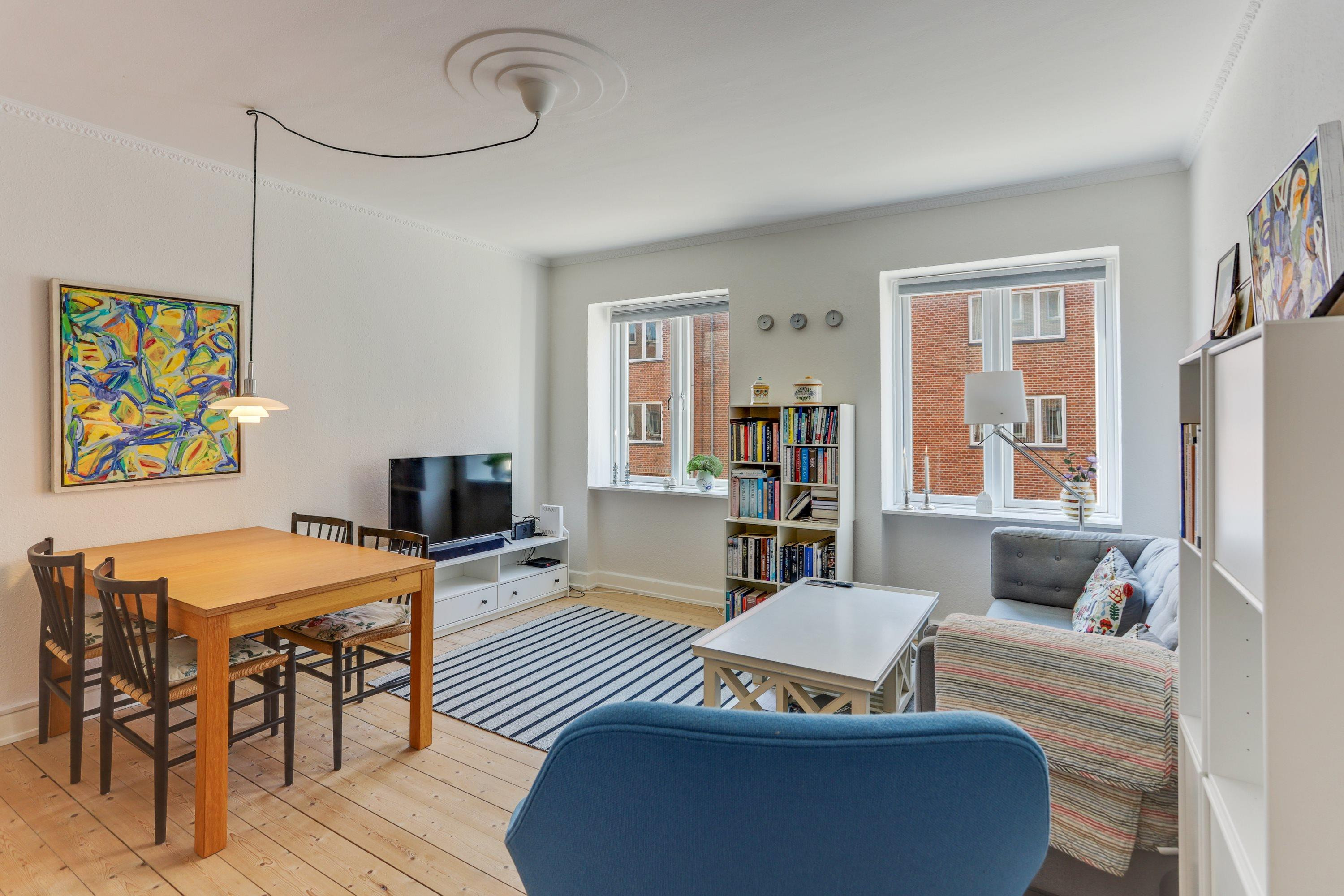 Velindrettet og moderniseret 3V'er med altan og garage i hjertet af Vestbyen