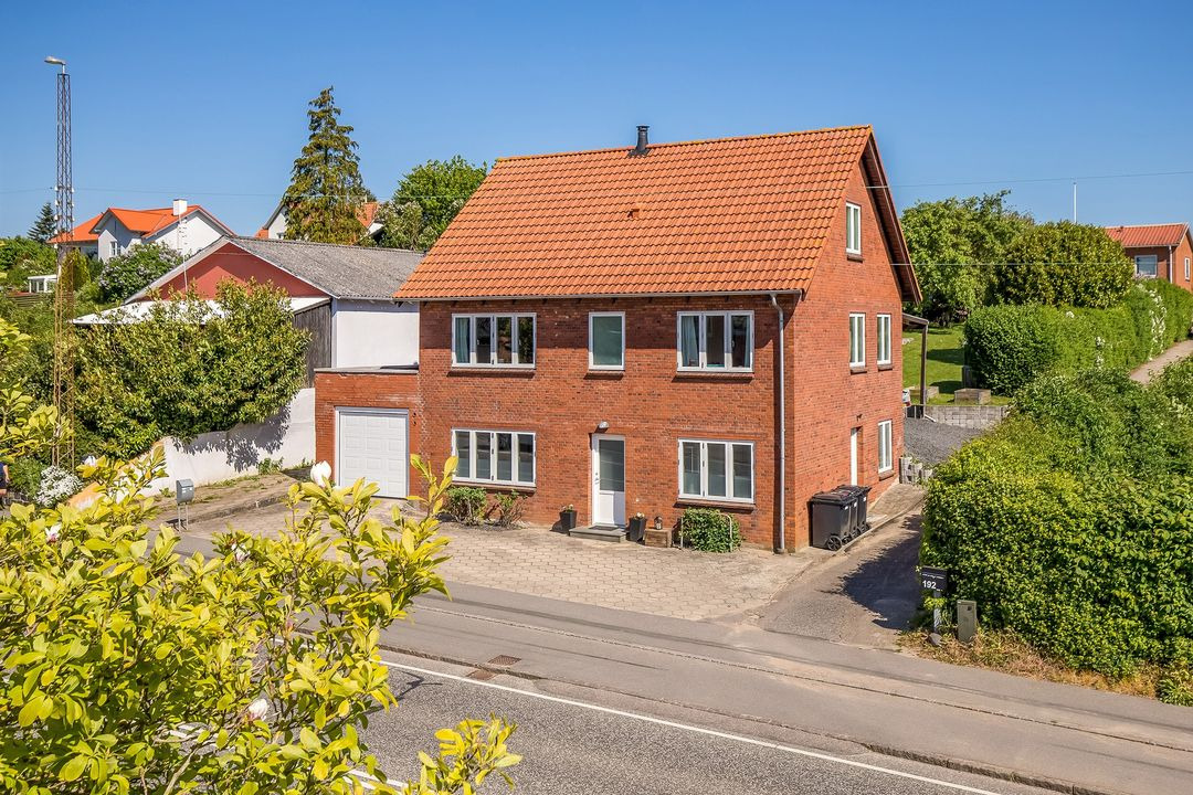 RealMæglerne Middelfart: Prisjustering på centralt beliggende villa i Middelfart