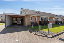 John Frandsen Herning præsenterer andelsbolig i Hammerum med carport og vinterhave