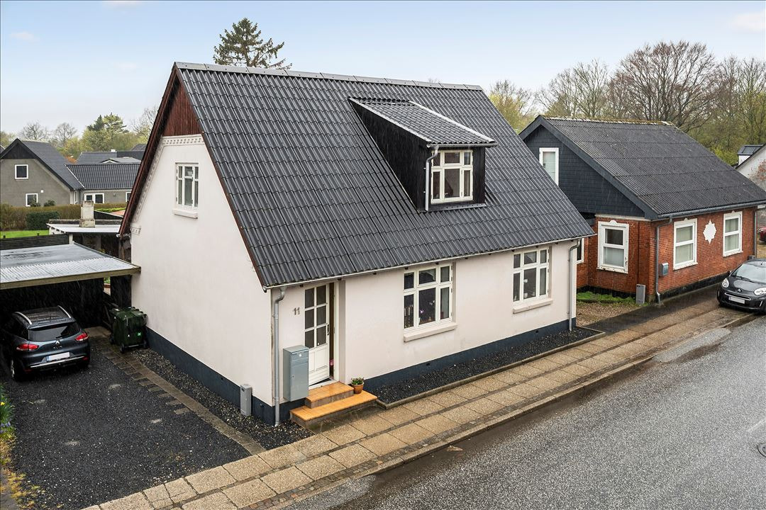 Charmerende med flotte rapporter og asbestfrit tag