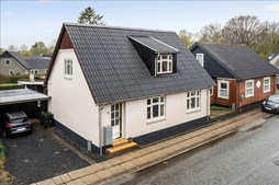 Charmerende med flotte rapporter og asbestfrit tag