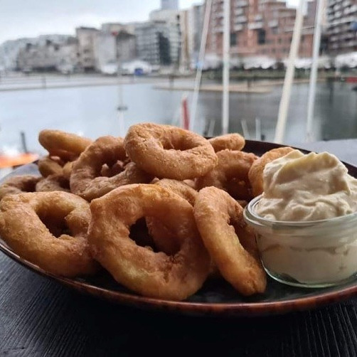 Beringsslagteren ApS tilbyder panerede blæksprutteringe til kun 130 kr.