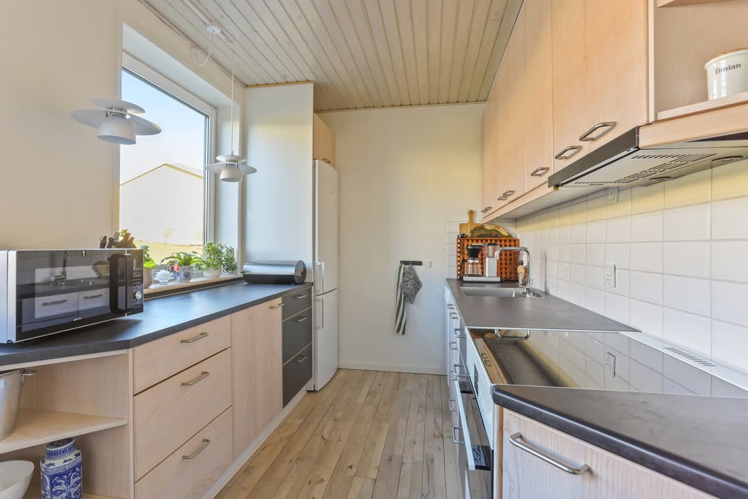 Mæglerhuset Aalborg har ny pris på velholdt lejlighed med privat terrasse