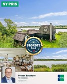 Ny pris på charmerende stråtagshus ved Randers Fjord fra Nybolig Bjørn & Ankersen