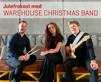 Festlig julefrokost i Pakhuset: En aften fyldt med musik og lækker mad