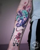 Tattoo Studio 96 præsenterer farverigt koi-fisk tattoo af Andrei