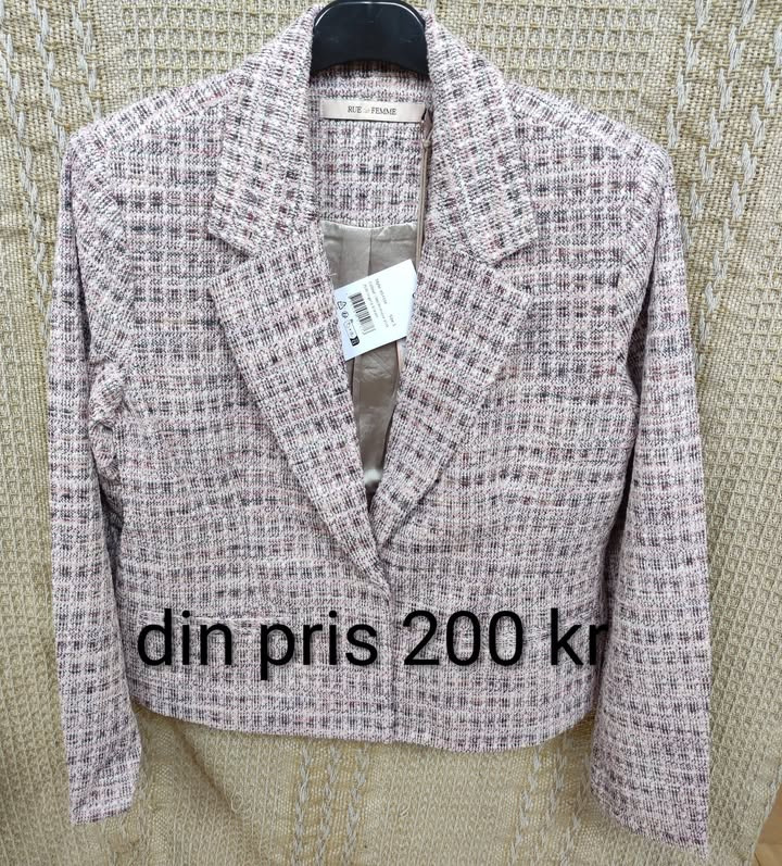 Rie & Henrik's Tøjbiks i Randers præsenterer nye jakker og veste til gode priser