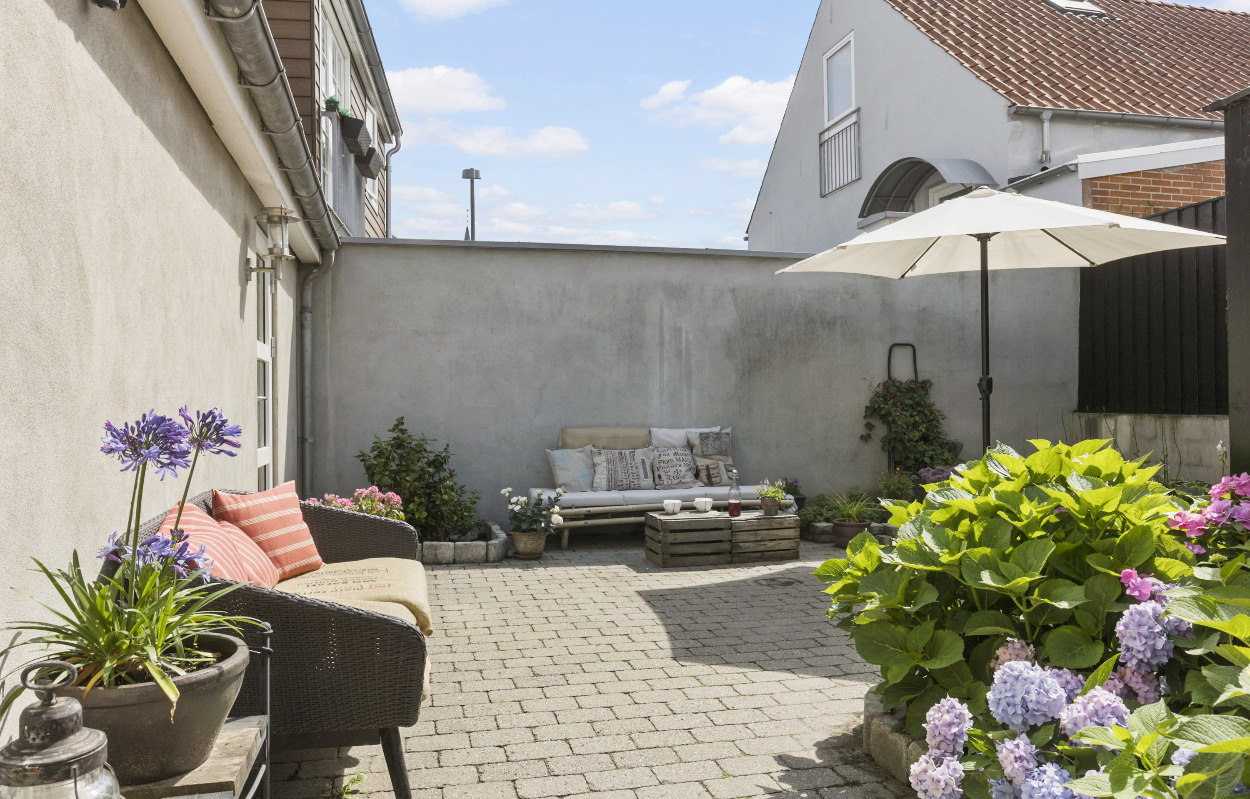 Charmerende byhus med masser af plads til salg hos EDC Trio