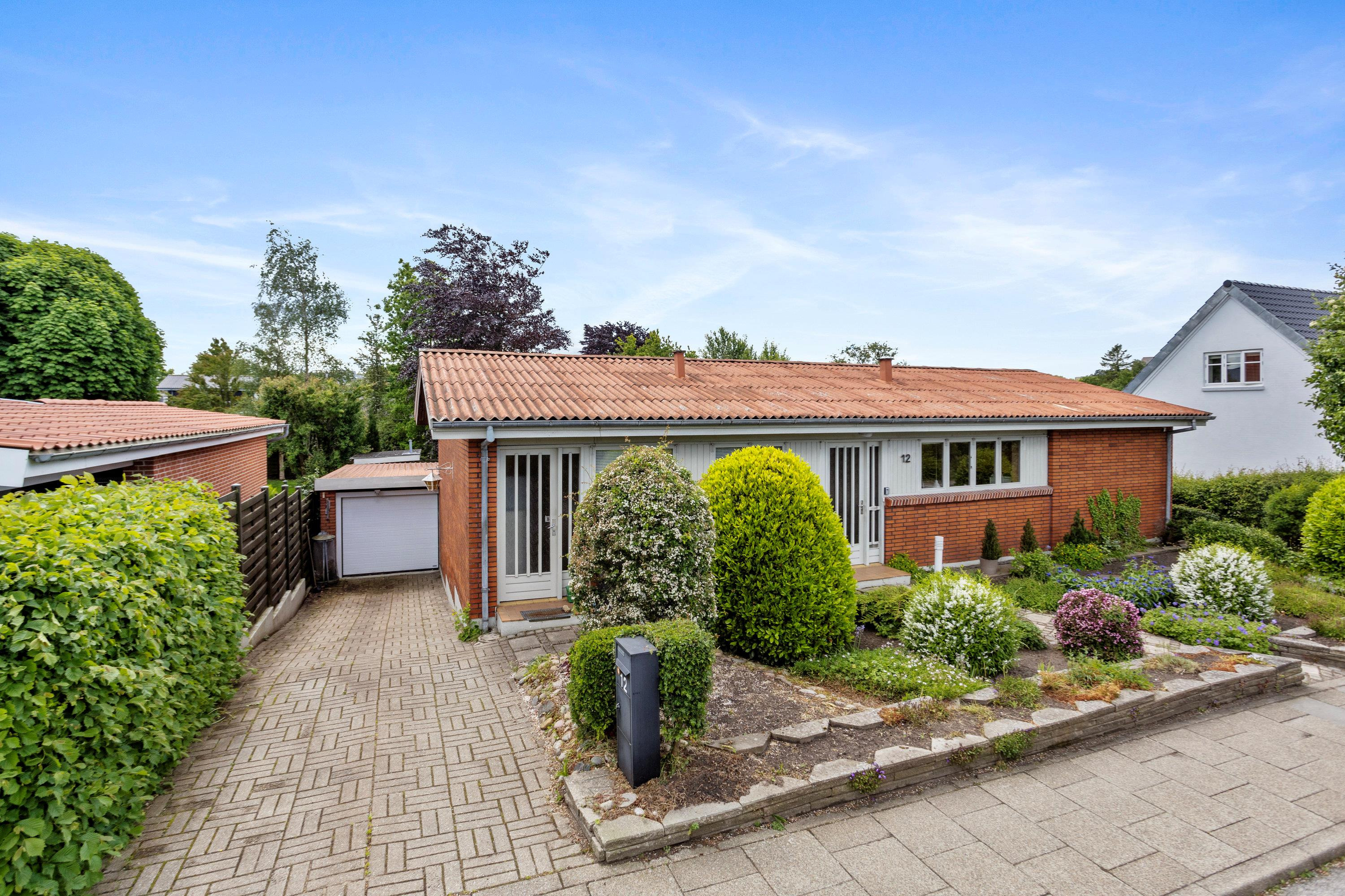 Velindrettet etplansvilla med sydvendt have og rolig beliggenhed i Vejgaard