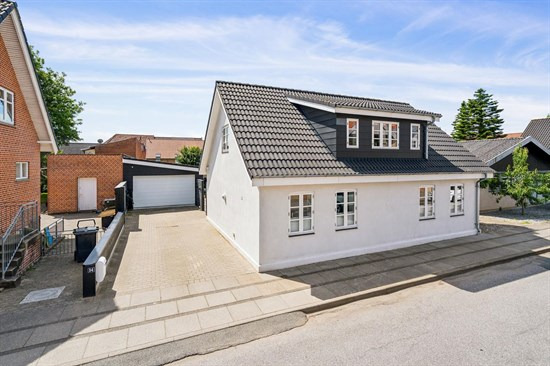 Hyggeligt byhus på stille vej i Brønderslev centrum