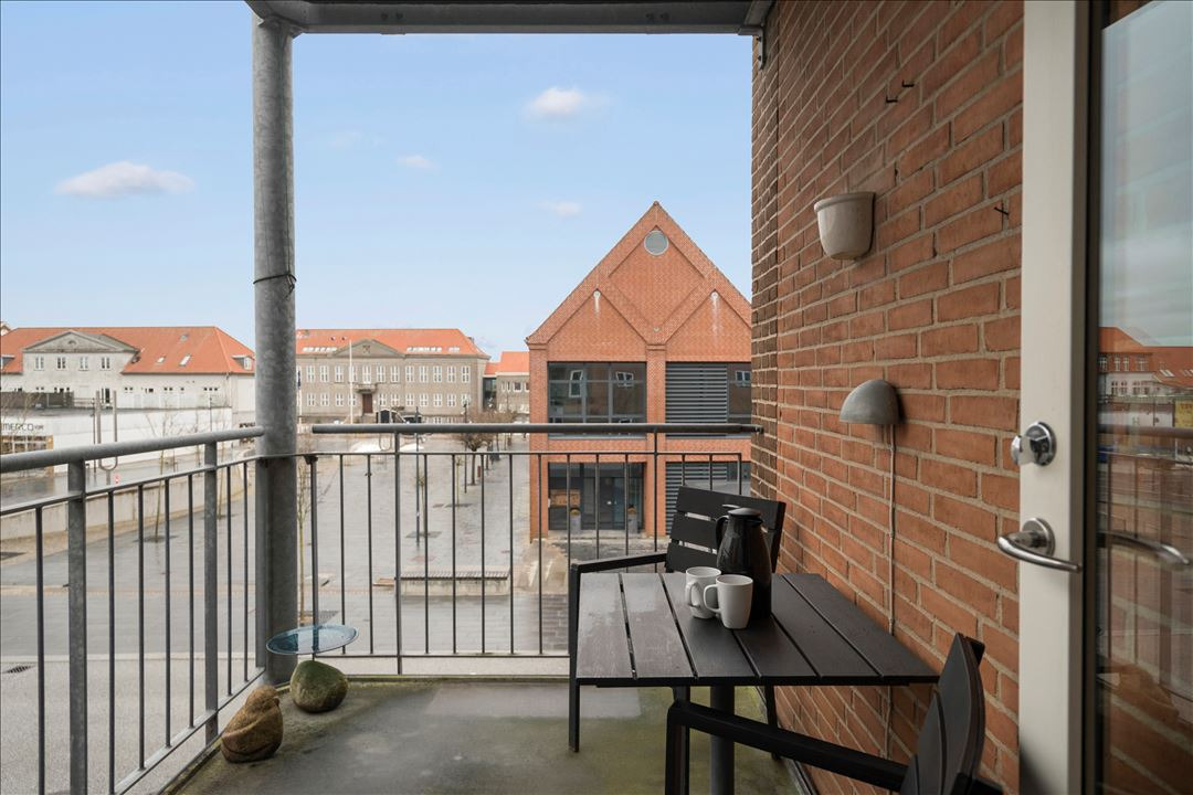 Til salg hos EDC Ejen­doms­grup­pen Struer: Velindrettet an­dels­lej­lig­hed i midtbyen