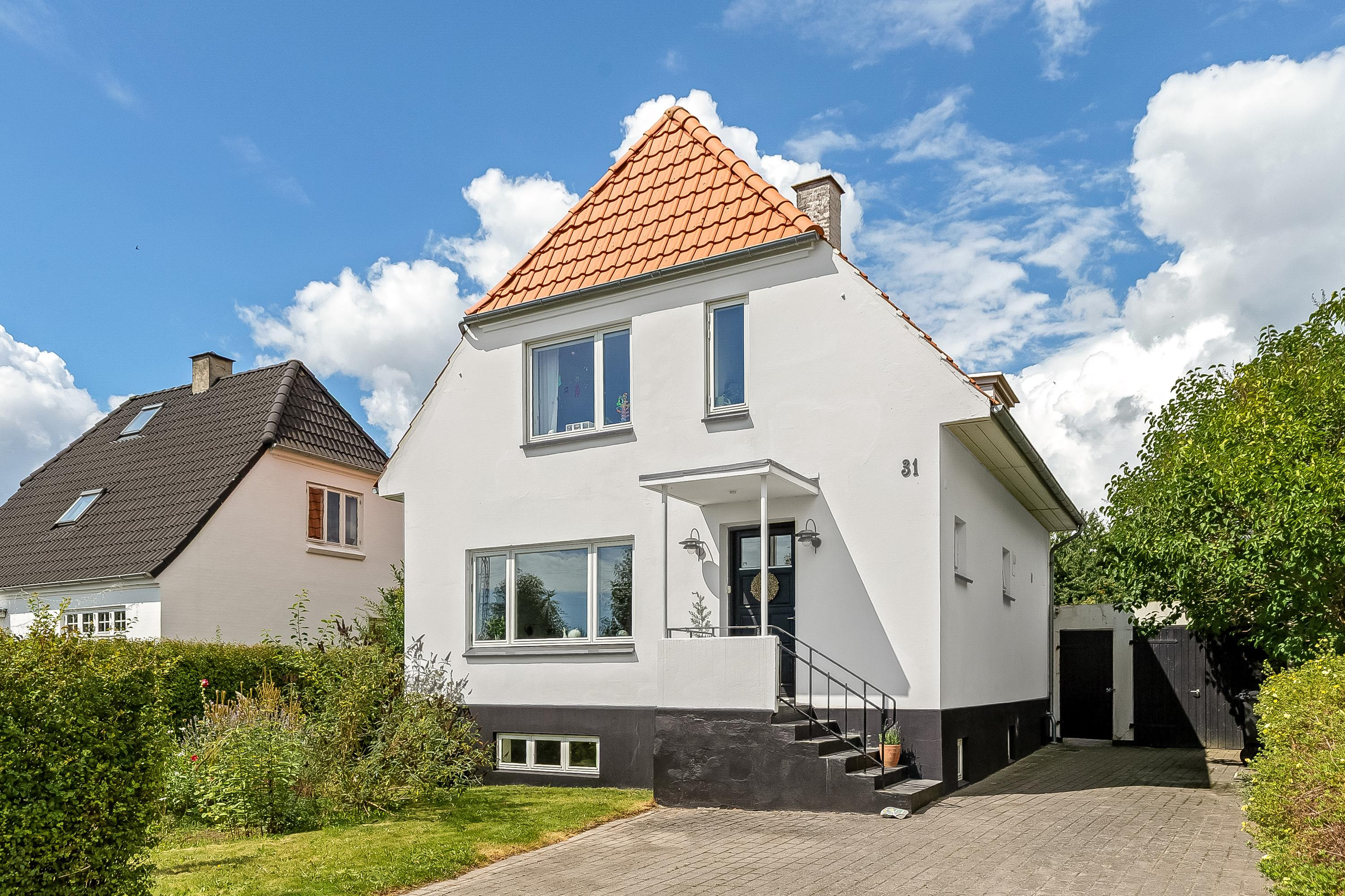 Charmerende, hyggelig og rummelig murermestervilla fra 1934