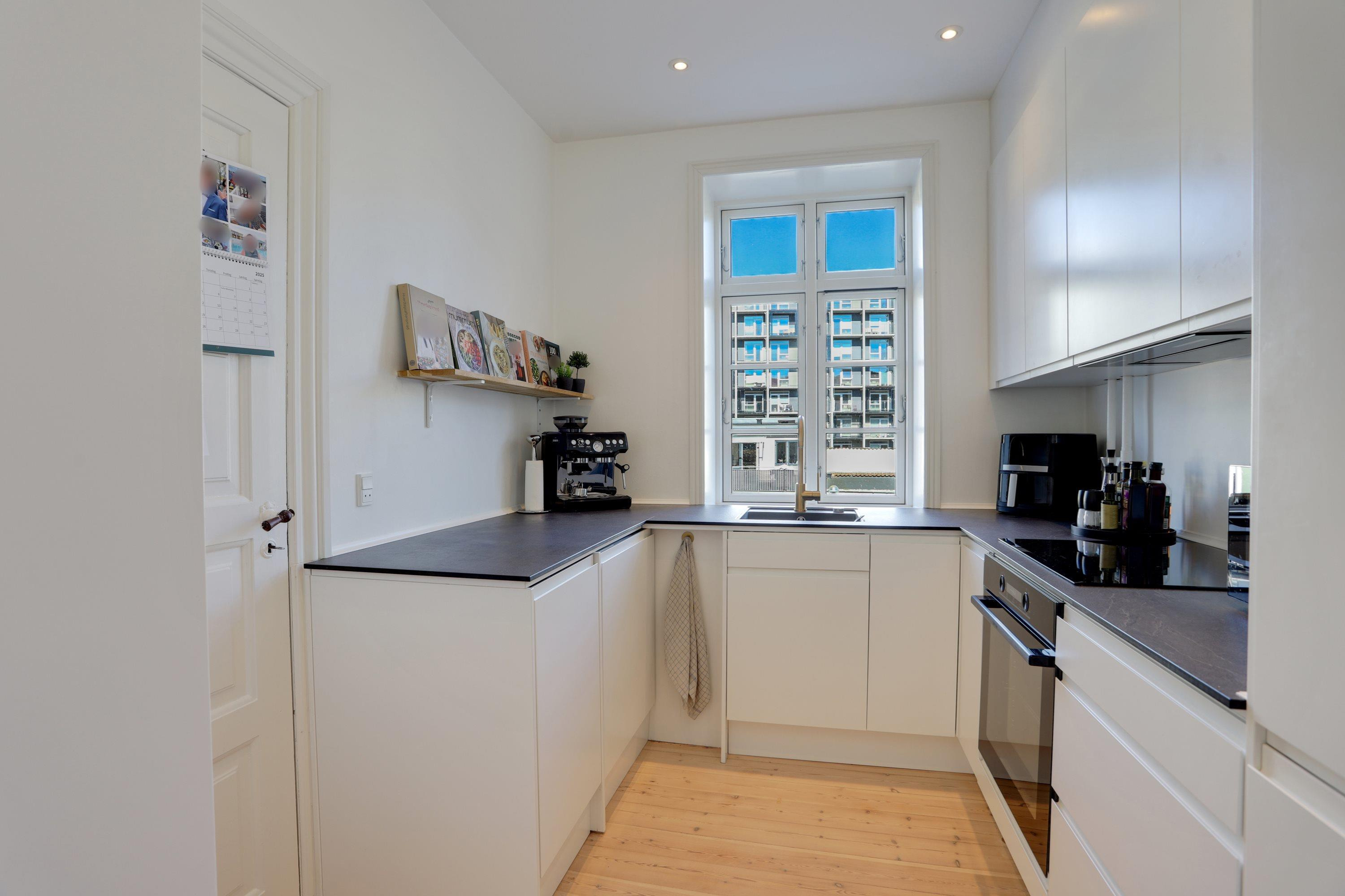 Gennemrenoveret og stilren 2V’er i det attraktive Østerbro-kvarter