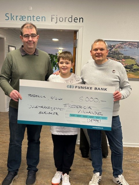 Fredericia Vinhandel ønsker glædelig jul og takker for støtte til Julemærkehjemmet i Skælskør