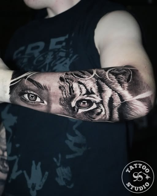 Tattoo Studio 96 fremhæver kunstner Raza med imponerende tiger- og menneskeøjne tatovering